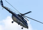 Pilot killed when helicopter hits power line, crashes into river in Russia