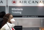 Air Canada нь нүүрний хамгаалалтыг заавал хийдэг