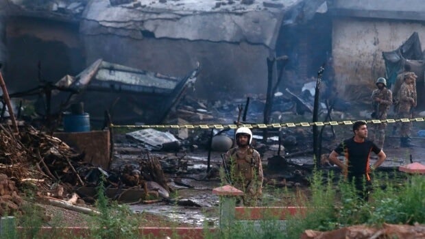 17 people killed when plane crashes into residential area in Pakistan