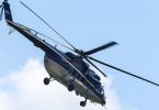 Pilot killed when helicopter hits power line, crashes into river in Russia