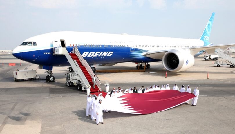 New Boeing B777-9 jet flies to Doha International Airport.