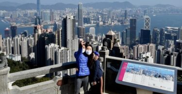 Desperate for tourists Hong Kong finally goes mask-free
